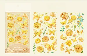 Macro detail of Fairy Forest floral stickers with golden butterfly and yellow rose patterns