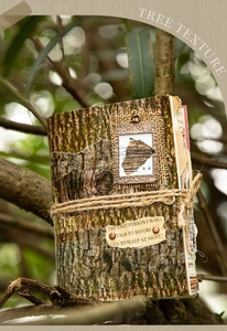 Detail of tree texture notebook cover with vintage metal frame and jute twine wrap