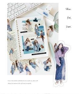 Close-up of urban lifestyle girl character PET stickers on a notebook and stationery