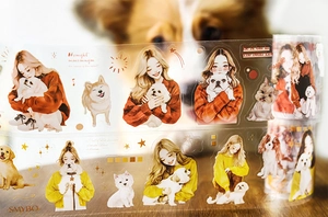 Detail of PET decorative tape featuring warm illustrations of a girl with golden retrievers