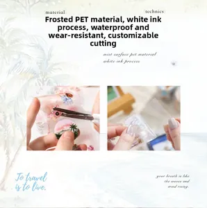 Macro shot of waterproof matte PET travel stickers with camera and beach illustrations