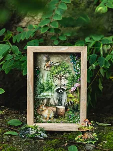 Detailed 3D shadow box frame featuring forest animal paper art on mossy background