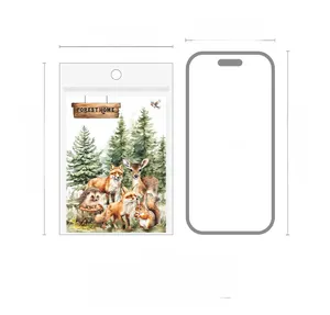 Size comparison of forest animal stickers package next to an iPhone 15 mockup