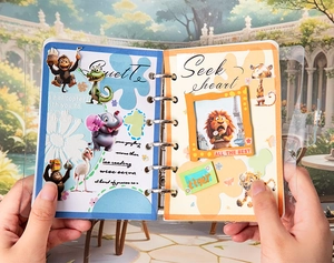 Detail of PVC clear binder with forest animal stickers and 6-hole metal ring closure