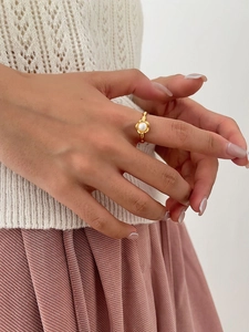 Close-up of elegant S925 sterling silver ring with natural freshwater pearl on hand