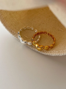 Macro shot of S925 sterling silver stamp on the inner band of the heart ring