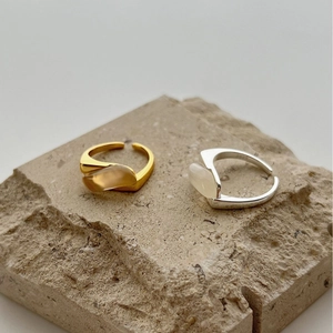 Minimalist 925 sterling silver open rings with chalcedony on stone pedestal