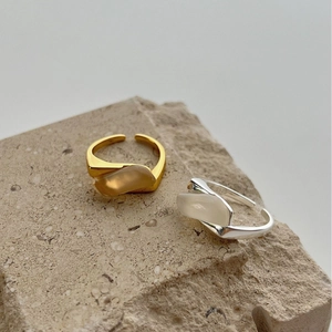 Minimalist S925 sterling silver rings with white chalcedony on a natural stone base