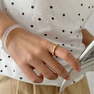 Elegant S925 sterling silver bow ring in gold finish paired with lavender jade bracelet