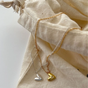 Collier en argent sterling 925 avec pendentif cœur gravé d'une étoile en or et argent