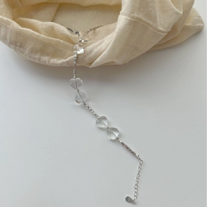 925 silver heart bracelet with white crystals and extension chain on linen pouch
