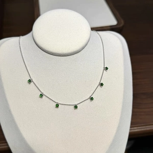 925 Sterling Silver necklace with 7 round green chalcedony pendants on a jewelry bust