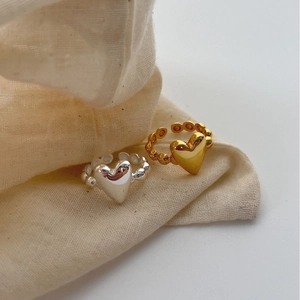 Stereo heart-shaped open ring set in gold and silver finish with beaded texture