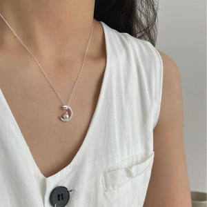 Elegant crescent moon pendant necklace with white pearl and sparkling crystals on fine chain