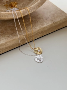 Detailed macro of S925 sterling silver heart necklaces with sparkling cubic zirconia