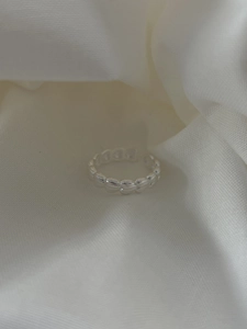 Detailed view of S925 sterling silver adjustable ring with braided oval bead texture