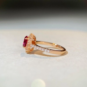Pigeon blood ruby ring in 925 silver with rose gold finish and diamond accents