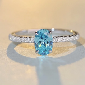 S925 sterling silver ring featuring oval blue aquamarine gemstone and sparkling zircon accents