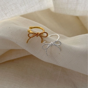Elegant 925 sterling silver bow ear cuffs in gold and silver with twisted rope texture