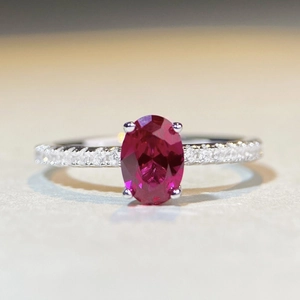 Classic S925 sterling silver ring with oval blue zircon and pavé diamonds on the band
