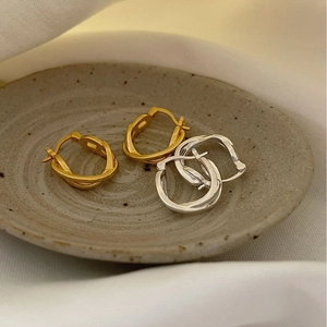 French style 925 sterling silver twisted hoop earrings in gold and silver finish