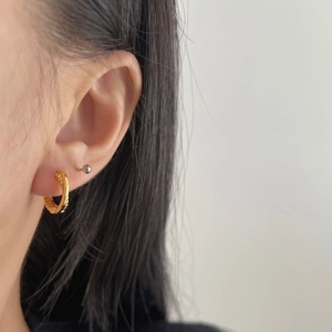 925 silver twist hoop earrings and ball stud set shown on a model for daily wear