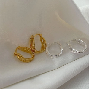 Minimalist 925 sterling silver twisted hoop earrings in gold and silver finish