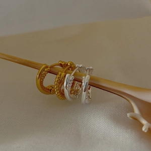 Minimalist 925 silver twist and smooth double-layered huggie earrings in gold and silver