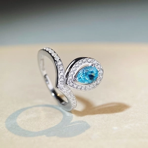 Elegant S925 silver pear-shaped crown ring with aquamarine blue zircon and wave band