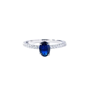 Elegant S925 sterling silver ring featuring an oval blue zircon and pavé-set stones
