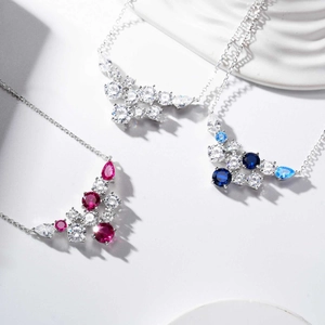 Detailed close-up of S925 sterling silver necklaces with pear-cut colorful zircons