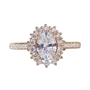 Classic 18K gold ring with large oval center stone and halo pave setting for wedding