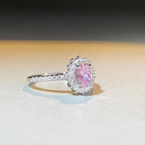 Elegant 925 sterling silver snowflake ring with oval pink gemstone and double diamond halo