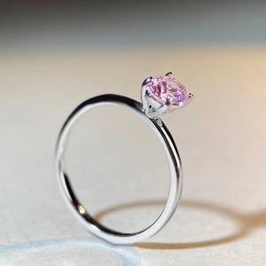 Minimalist S925 sterling silver ring featuring a round pink solitaire diamond in a 4-prong setting