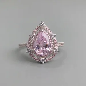 Elegant S925 sterling silver ring with pink pear-cut gemstone and double halo diamonds