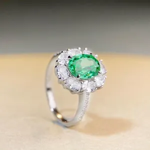 Classic oval Paraiba green gemstone ring with halo diamonds in 925 sterling silver