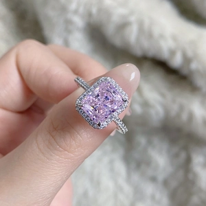 Detailed macro view of high-quality 925 silver ring featuring radiant cut pink gemstone