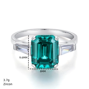 Macro detail of emerald cut green zircon ring with dimensions 9.6mm and 3.7g weight