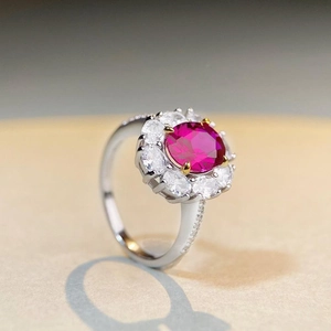 Elegant 925 sterling silver ring featuring a large oval ruby halo and sparkling diamonds