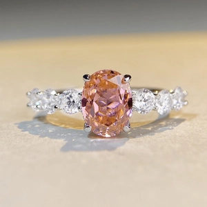 Pink oval high-carbon diamond S925 sterling silver ring with halo pavé setting details