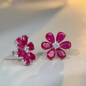 Sparkling S925 sterling silver daisy stud earrings with pink gemstone flower petals