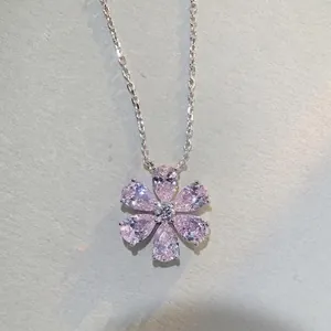 Minimalist s925 silver flower necklace with pink pear-cut zircon petals and a center stone