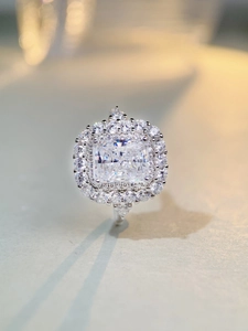 Macro view of Radiant cut ring featuring a large rectangular cubic zirconia with double halos