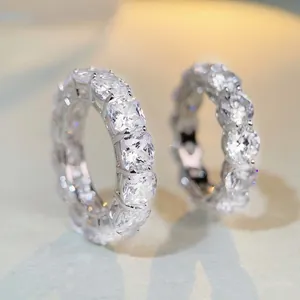 Macro detail of radiant cut full eternity bands in s925 silver with sparkling diamonds