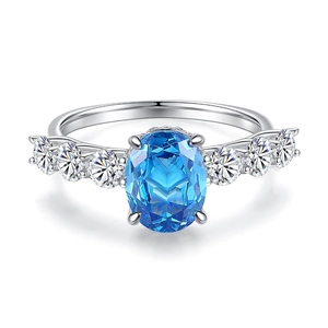 S925 sterling silver ring with large oval blue crystal and brilliant side zircons