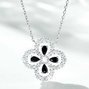 Elegant S925 sterling silver four-leaf clover necklace with black stones and yellow zircon