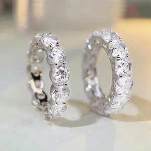 Sparkling S925 sterling silver eternity rings with round and cushion cut zircon stones