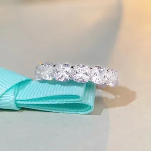 Eternity band featuring cushion cut sparkling cubic zirconia in S925 sterling silver