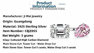 Macro detail of S925 silver ring featuring 5ct emerald cut and 3ct pink pear cut diamonds