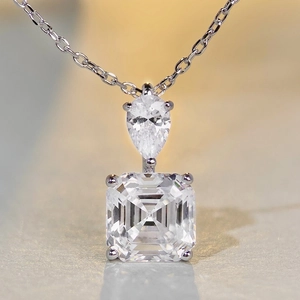 Elegant S925 silver necklace featuring water drop and square carbon diamond pendants